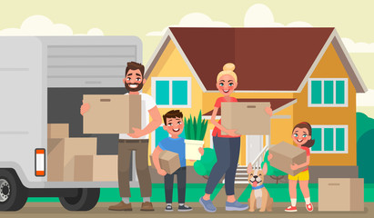 Happy family moves to a new house. Father, mother and children are holding boxes with things in the background of the home