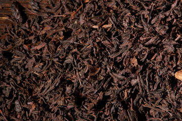 Black tea background close up. top view. Concept