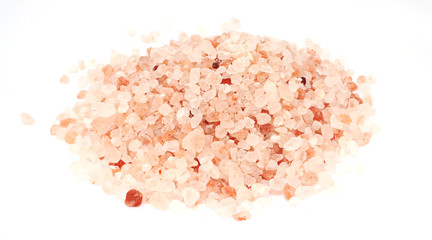 Heap of himalayan salt isolated on white background. 