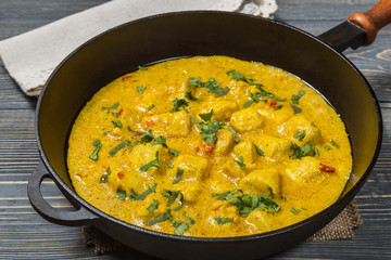Spices for making curry sauce on a dark background. 