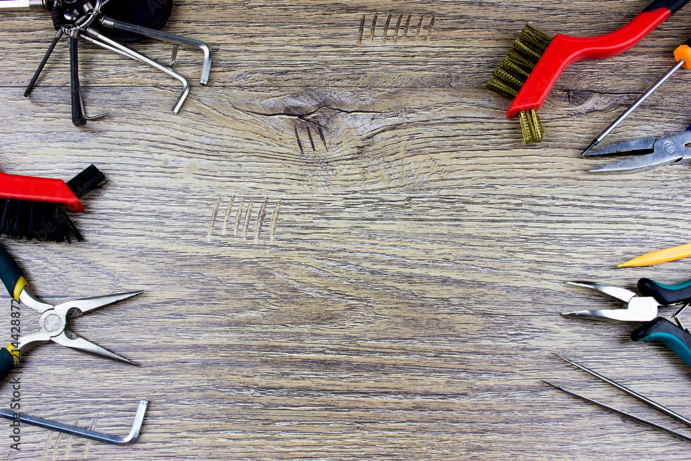 Poster tools and instruments on a wooden table