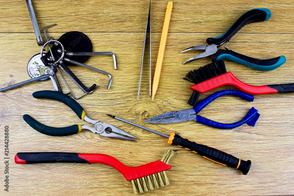 Poster tools and instruments on a wooden table