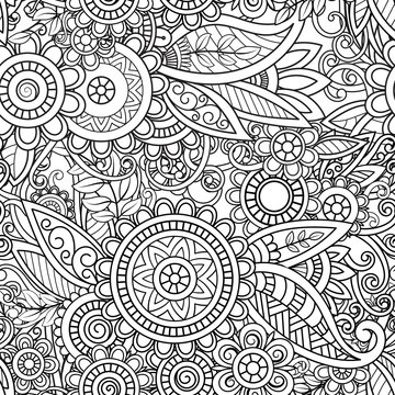 Ethnic seamless pattern with mandalas, flowers and leaves. Doodles floral black and white ornament. Perfect for wallpaper, adult coloring books, web page background, surface textures.