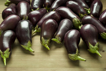 eggplants on wooden