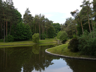 quiet calm waters of a lake located in a pine forest a good place to take a break from the city...