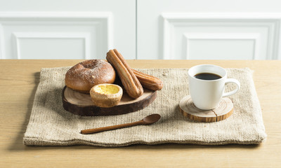 Breakfast prepared with delicious breads and prepared meal