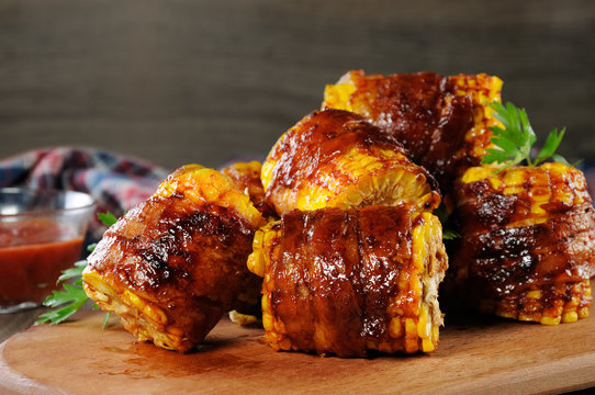 Grilled corn wrapped in bacon