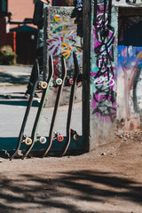 Skateboards piled at the park © Martin