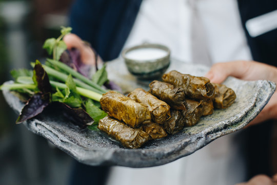 Caucasian traditional dish meat wrapped in grape leaves called dolma