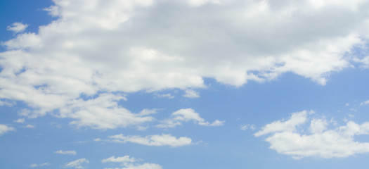 Naklejka na ściany i meble clouds in the blue sky gentle lungs