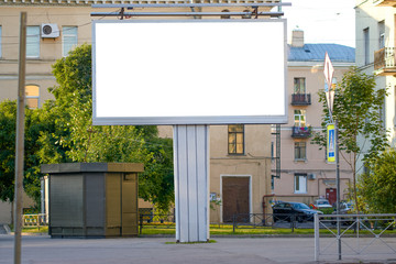 billboard in the city. white advertising field for advertising