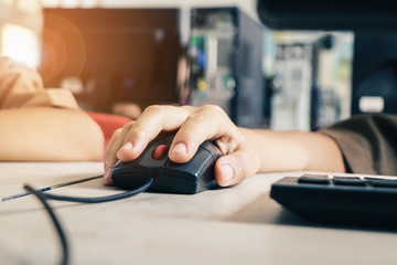 hand with computer mouse on classroom, education for internet of things