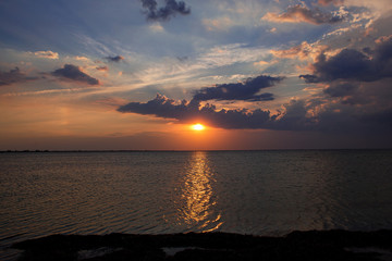 Sunset - the moment of disappearance of the upper edge of the star