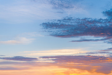 Beautiful summer sunset with clouds over the sea