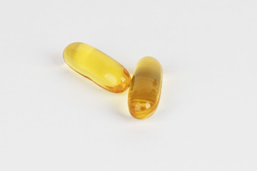 capsules source of selective focus in front object isolated on white background