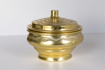 isolated old gold color copper kitchenware on the wooden background.