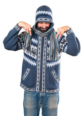 Man with winter clothes pointing down