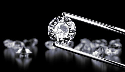 Diamond in tweezers on a dark background with diamonds group soft focusing, 3d rendering.
