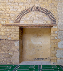 Recessed frame in an old stone bricks wall, Medieval Cairo, Egypt
