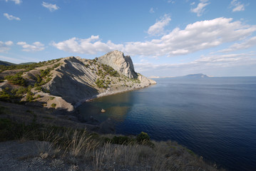 Fototapeta na wymiar beautiful Crimean slopes on the shore of the Chanoe sea.Tipping on the beach