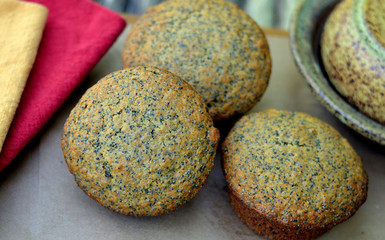 Three Honey ,Poppy Seed Muffins: close-up, high angle view.