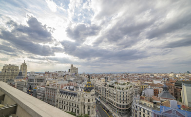 Naklejka premium Madrid, Spain cityscape above Gran Via shopping street. Spain during sunset.