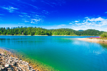     Beautiful blue Lokvarsko lake in colorful mountain landscape, Lokve, Gorski kotar, Croatia 
