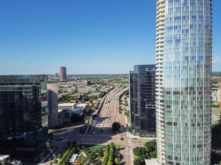 Dallas downtown landmark buildings and Woodall Rodgers Freeway (Texas Highway 366) aerial. Modern...