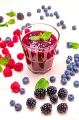 berry smoothies in a glass on a table