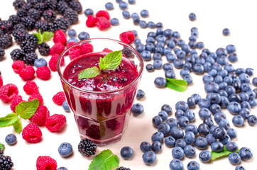 berry smoothies in a glass on a table