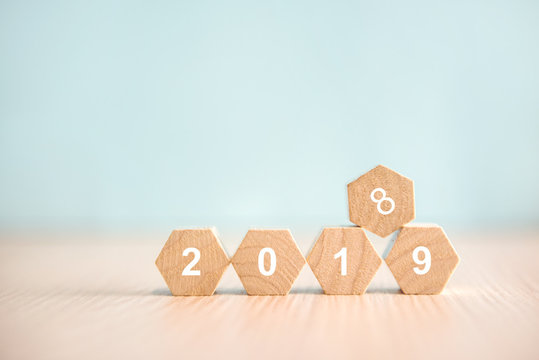 New year 2019 replace 2018 on wood block, Pastel style, background copy space. - Powered by Adobe