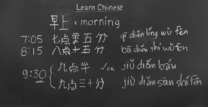 Learning chinese to tell time in class room.