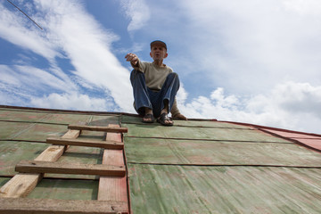 Senior man on the roof