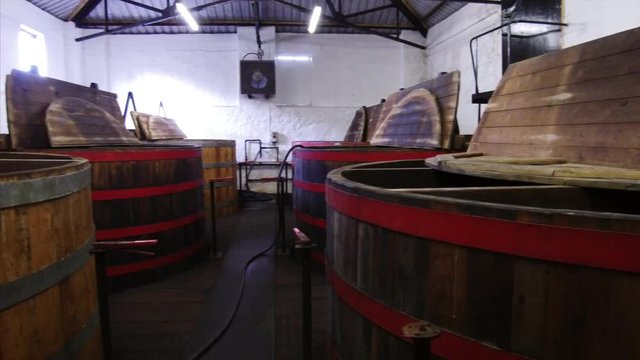 Panoramic shot of wooden tubs for barley fermentation in Campbeltown