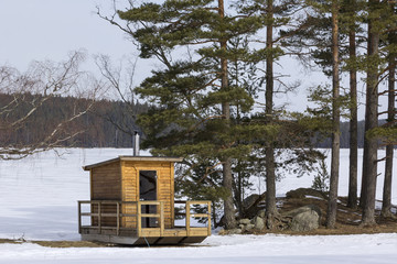 Little Sauna, sweatbath, near a typical swedish lake