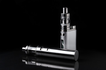 electronic cigarette or vaping device on black background