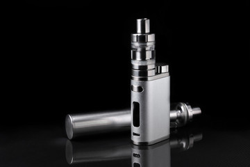 electronic cigarette or vaping device on black background