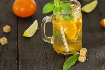 Refreshing summer cocktail with chopped ice and citrus fruits