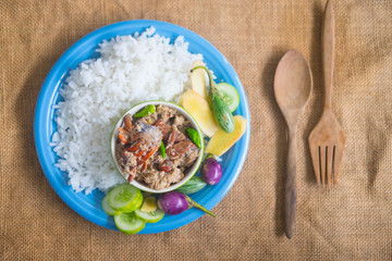 Salted crab stew with coconut milk served with rice