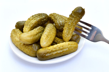Pickled cucumbers in a plate.