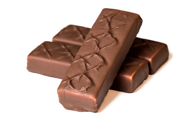 chocolate bars over white background