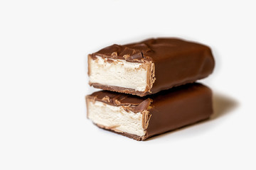 chocolate bars over white background