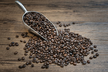 Roasted coffee beans in scoop