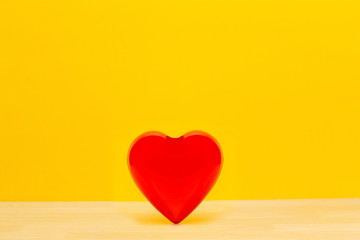 red heart and yellow background
