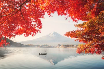 Poster Colorful Autumn Season and Mountain Fuji with morning fog and red leaves at lake Kawaguchiko is one of the best places in Japan © dewspliff