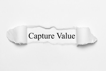 Capture Value on white torn paper