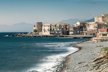 Fototapeta na wymiar Village and shingle beach of Erbalunga in Corsica