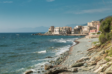 Fototapeta na wymiar Village and shingle beach of Erbalunga in Corsica