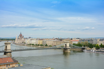 Fototapeta na wymiar Budapest, Hungary. View of the Antall József embankment, the Szechenyi Chain Bridge and the Hungarian Parliament building.