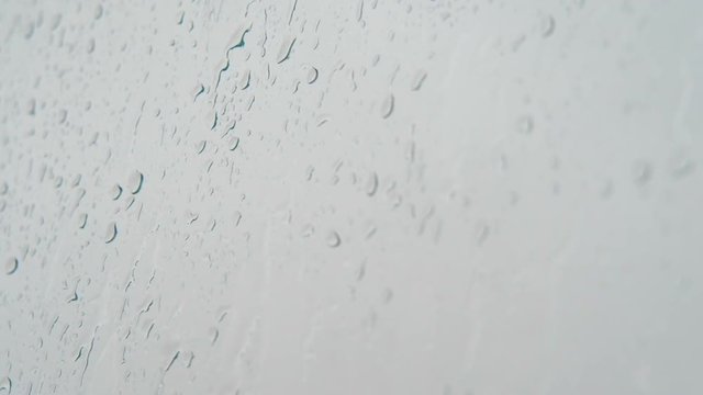 Rain drops on the glass.